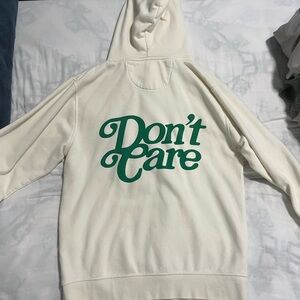 Cream Hoodie with Green 'Don't Care' Print